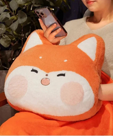 Cushion cozies are perfect for chilly days! This multifunctional plushie combines the softness of a huggable pillow with the coziness of a built-in hand warmer, all in an adorable cat design. 
Shaped like a charming fox with sweet embroidered details, it’s perfect for animal lovers of all ages. High quality and well constructed to keep its shape for a long time, you can also tuck your hands into the hidden pocket for instant warmth and cozy relaxation.